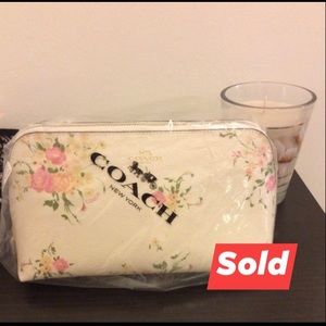 Beautiful authentic Coach makeup bag